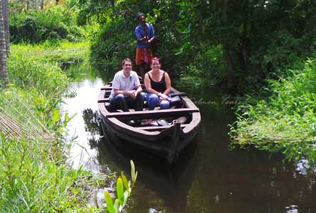 Guest traveling on country boat in Poothotta Backwater